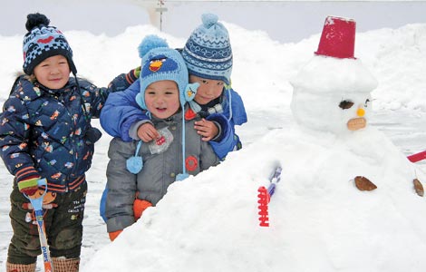 children and snowman